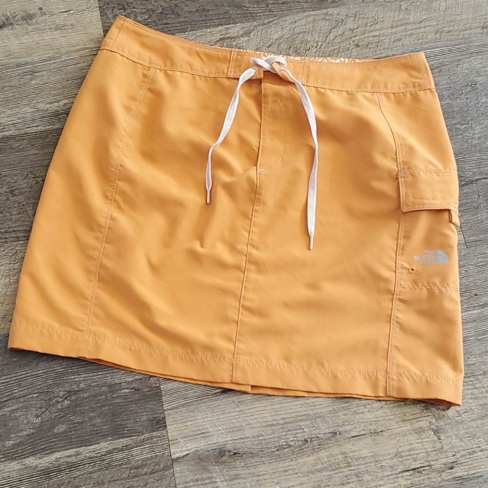 The North Face orange skirt velcro size 8